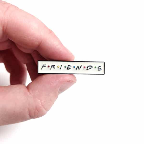 Friends logo enamel pin